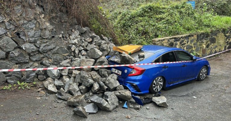 İstinat duvarı otomobilin üzerine yıkıldı